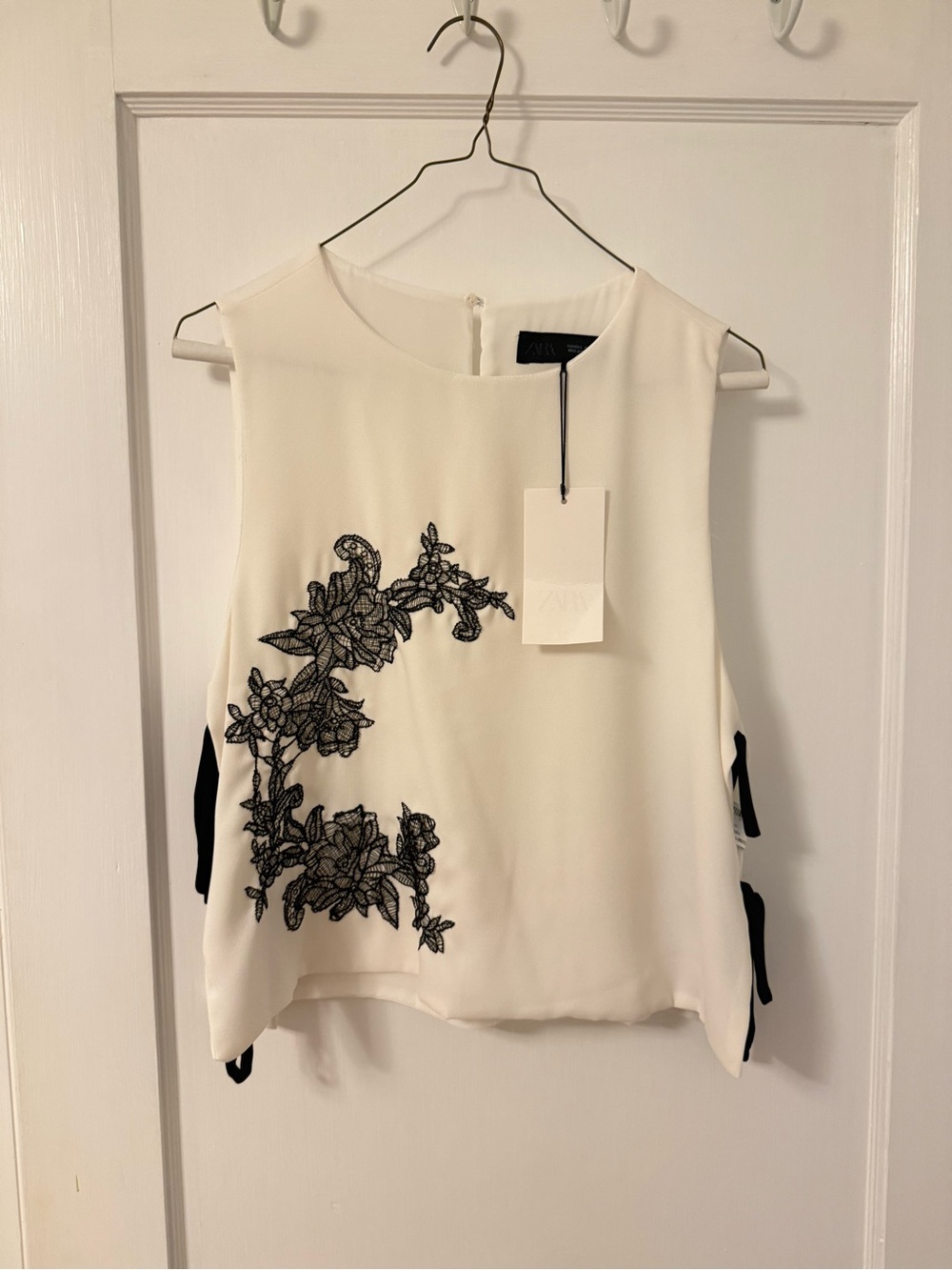 Zara White Sleeveless Top with Black Floral Appliqué
